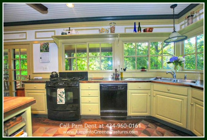The kitchen in this strikingly attractive historic home for sale in Central Virginia is one for the story books! Simply lovely!