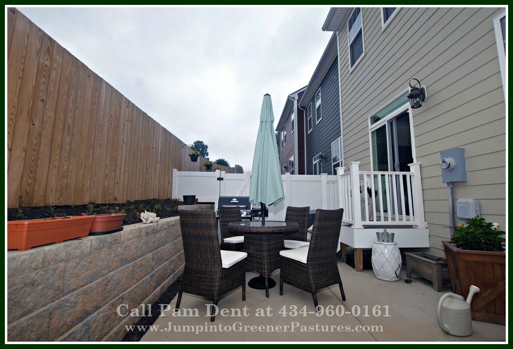Enjoy the intimate setting of the terrace in this townhome as you make the most of the lovely Charlottesville VA afternoons.